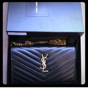 Saint Laurent classic wallet on a chain.